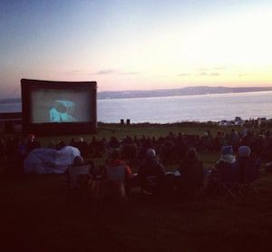 Skylight Outdoor Cinema Hire Seaside Event Blue Juice at Godrevey Point with Inflatable Pop-up Screen